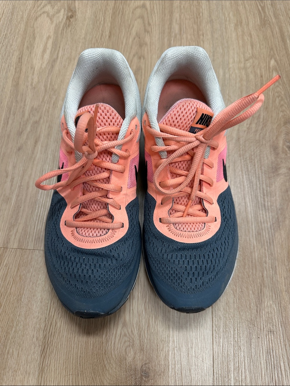 Nike women’s Coral Pink and Gray Lace-Up Sneakers